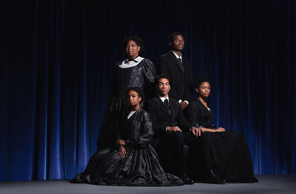 Moody image of opera performers, Black men and women in distinguished period clothing in front of a blue curtain