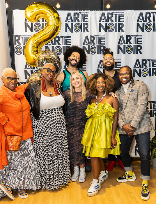 Group photo of Arte Noir event attendees