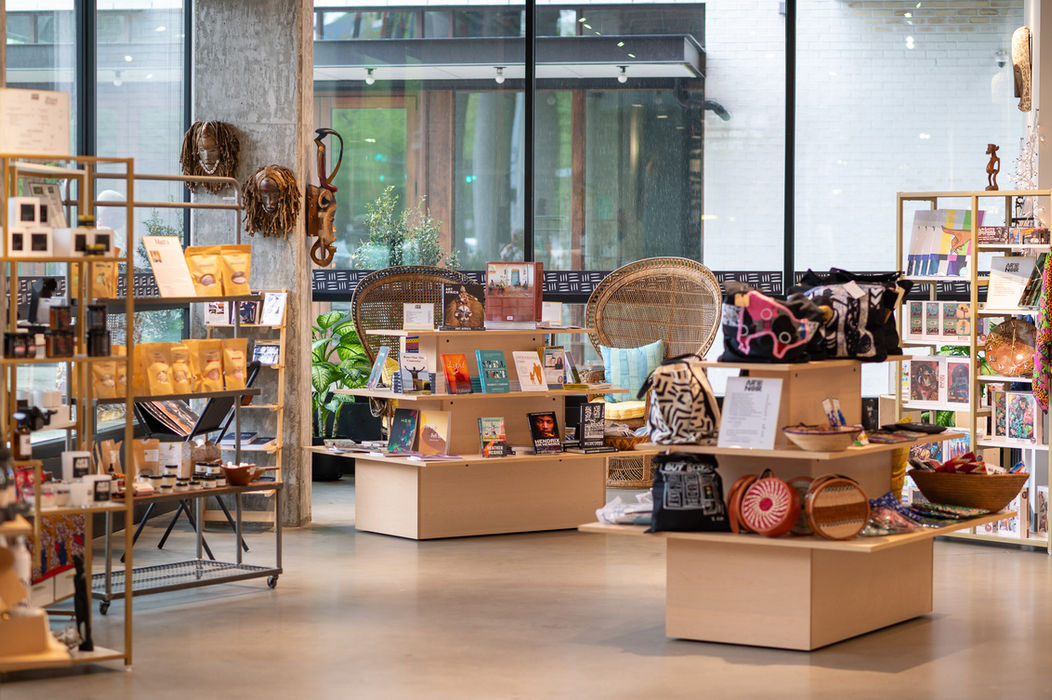 Artisan crafts and books displayed in a shop